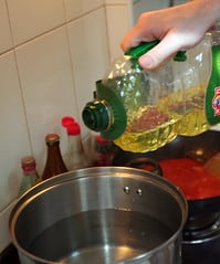 24: Olive oil into water