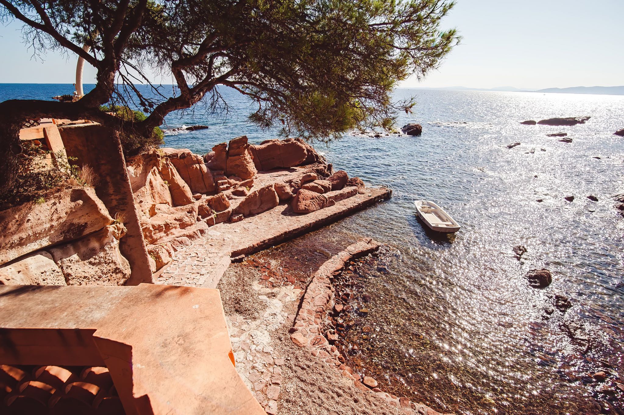 Discovering History: A shipwreck along the scenic Cote d'Azur coastline in southern France offers a stunning view for beachgoers and a glimpse into the area's rich maritime past.