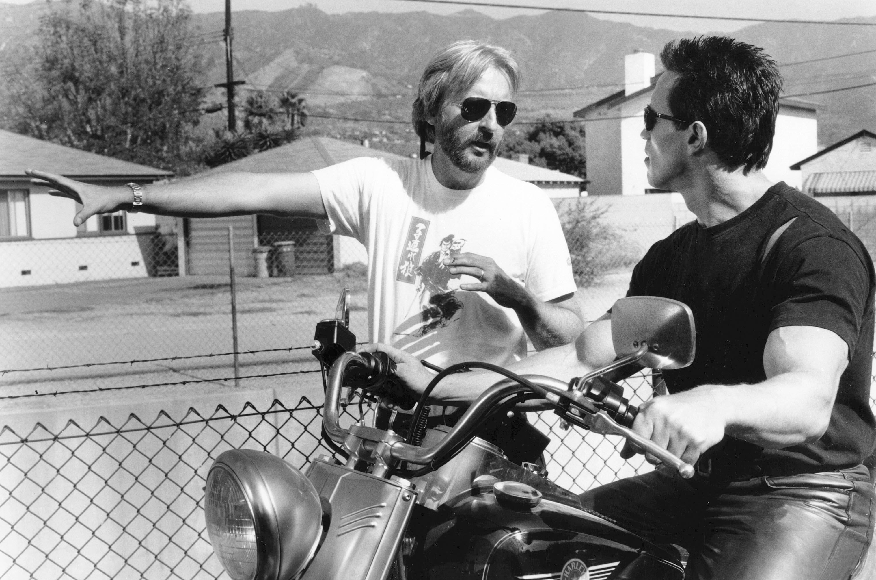 Arnold Schwarzenegger on motorcycle during Terminator 2 with James Cameron